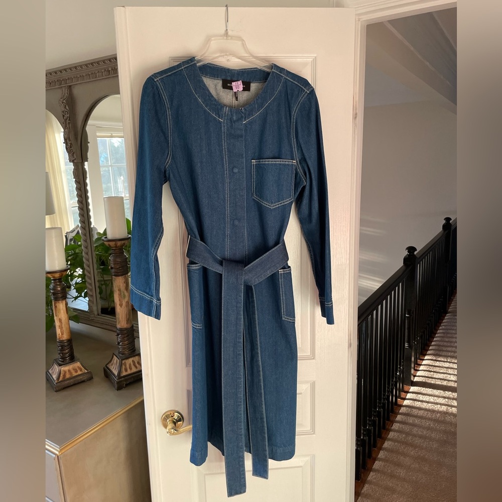 Denim jacket or can be worn as a dress! Beautiful quality by BCBG!